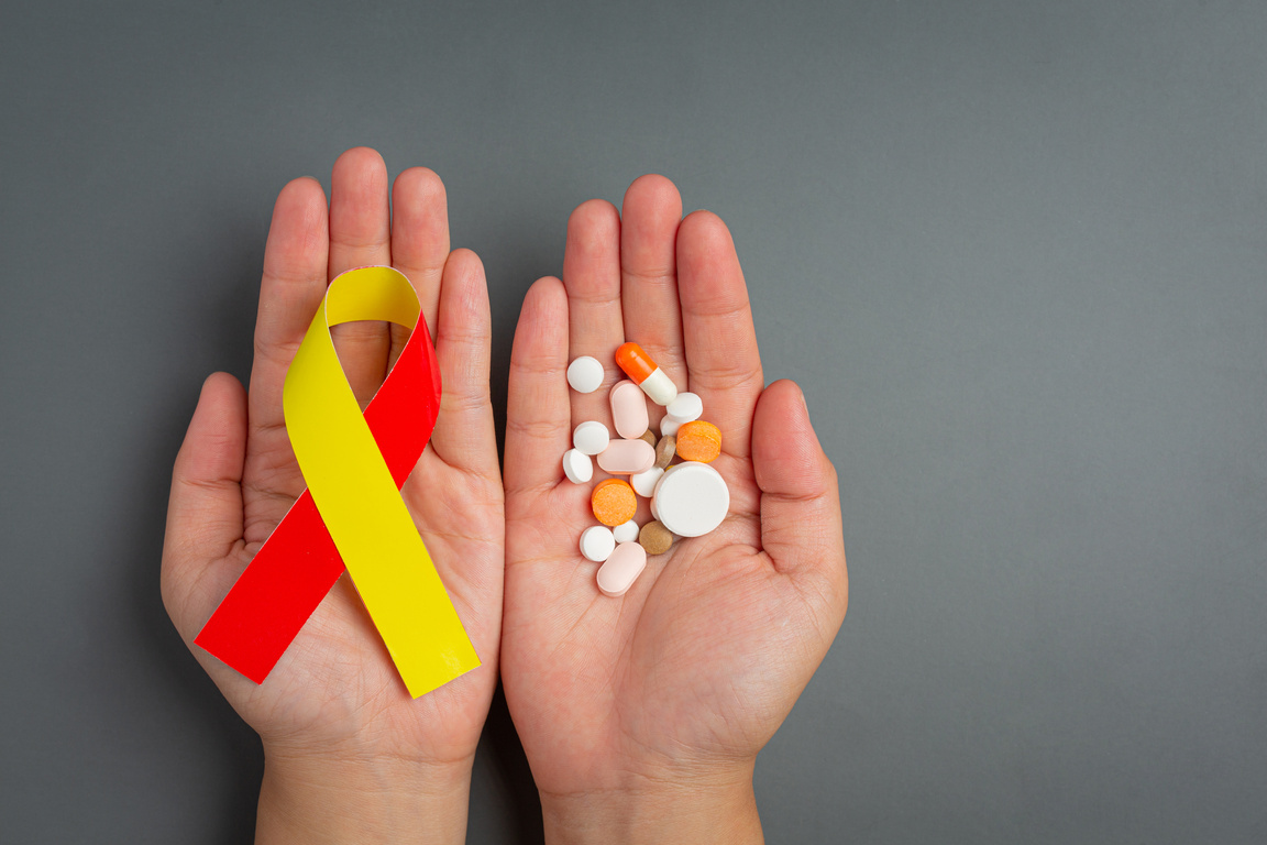 World Hepatitis Day Awareness with Red Yellow Ribbon